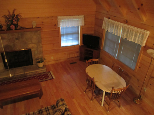 Cable TV, Hot tub, trash pick up, Two queen-size beds includes linens, bathroom shower/tub & two sinks, hairdryer, towels & wash clothes, kitchen includes range, refrigerator, microwave, toaster, coffeemaker | Highland Glade Cabin Rentals | Gatlinburg, TN